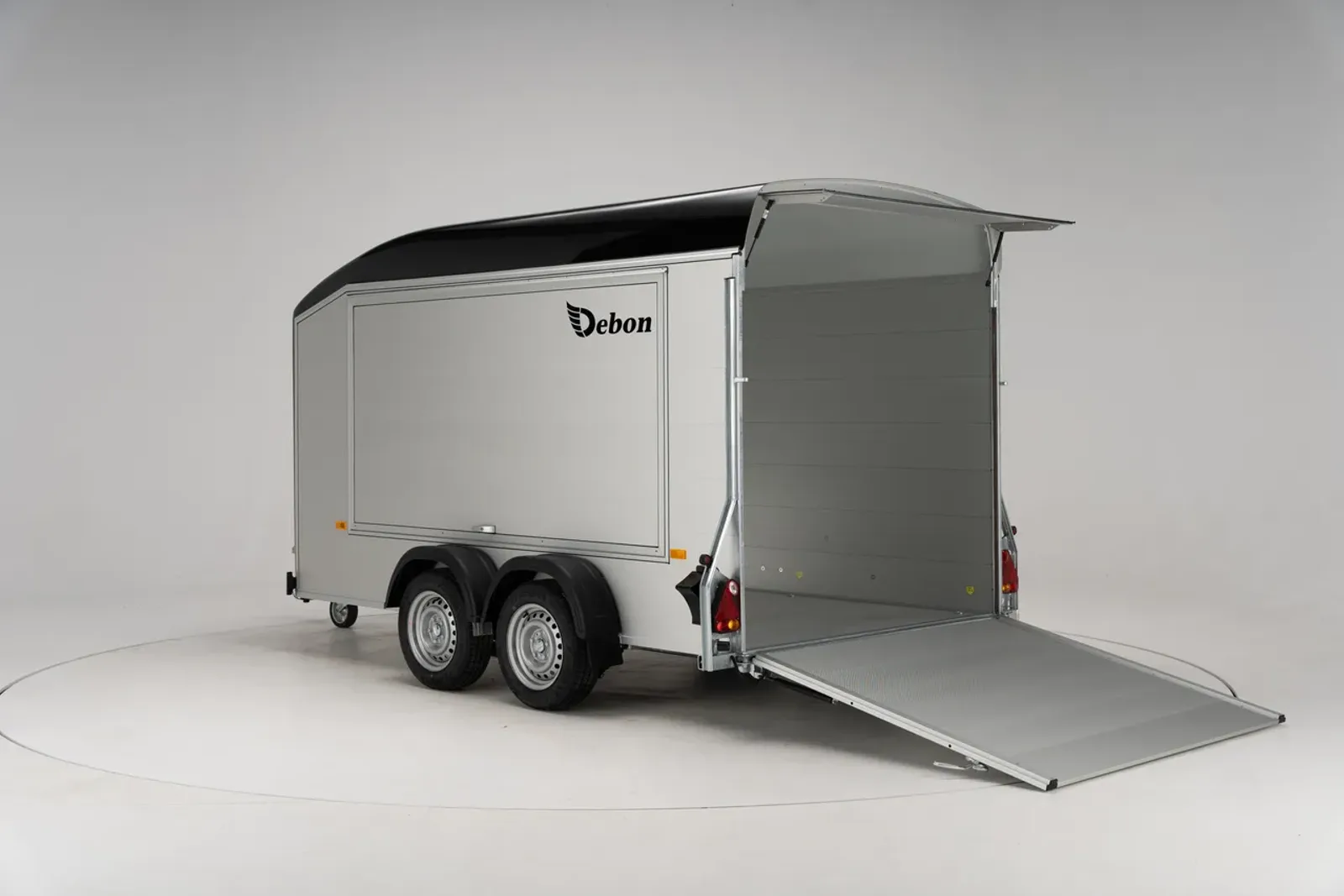 Enclosed box trailer with side door at a trades yard