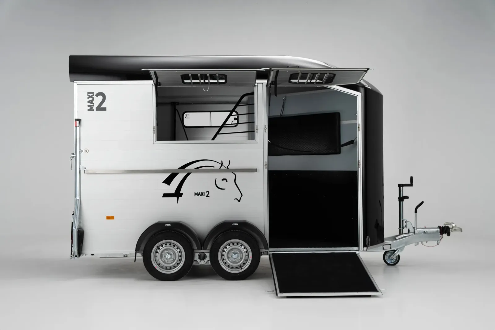 Twin-axle horsebox at a livery yard